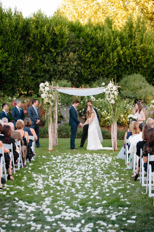Outdoor wedding on the lawn at Solage.