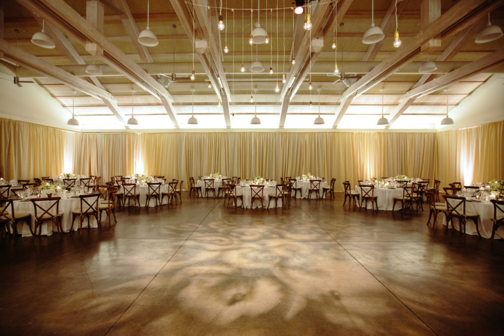 White and grey indoor wedding reception at Solage.