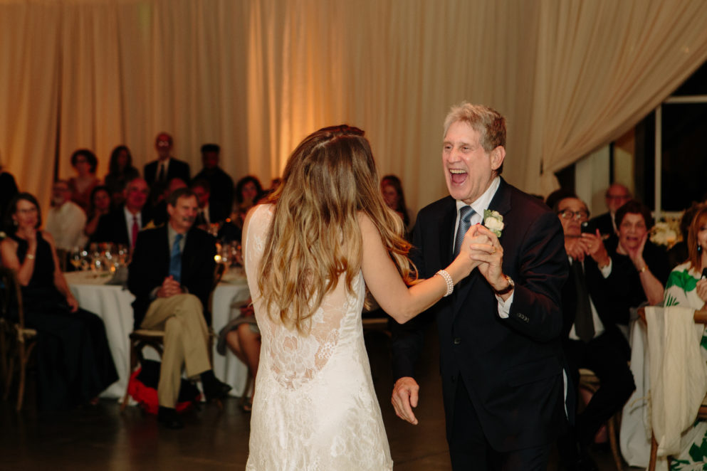 Dad dances with his daughter at her Solage wedding.