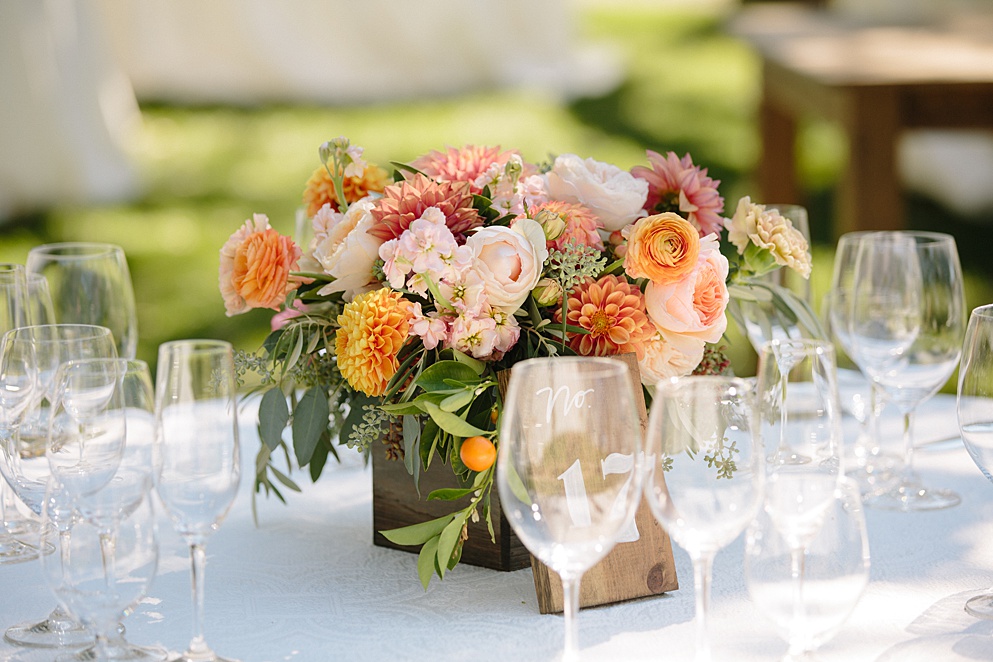 floral display on table for beltane ranch wedding by muchelle walker photography