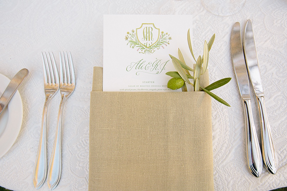 Beltane ranch wedding menu on table by michelle walker photography