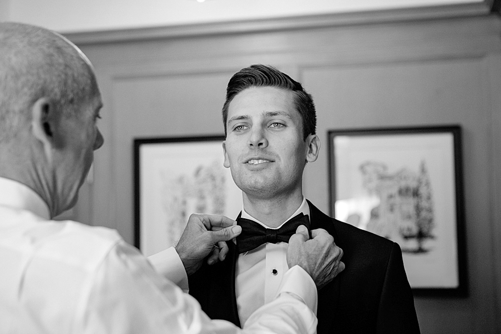 groom getting ready for california academy of sciences wedding