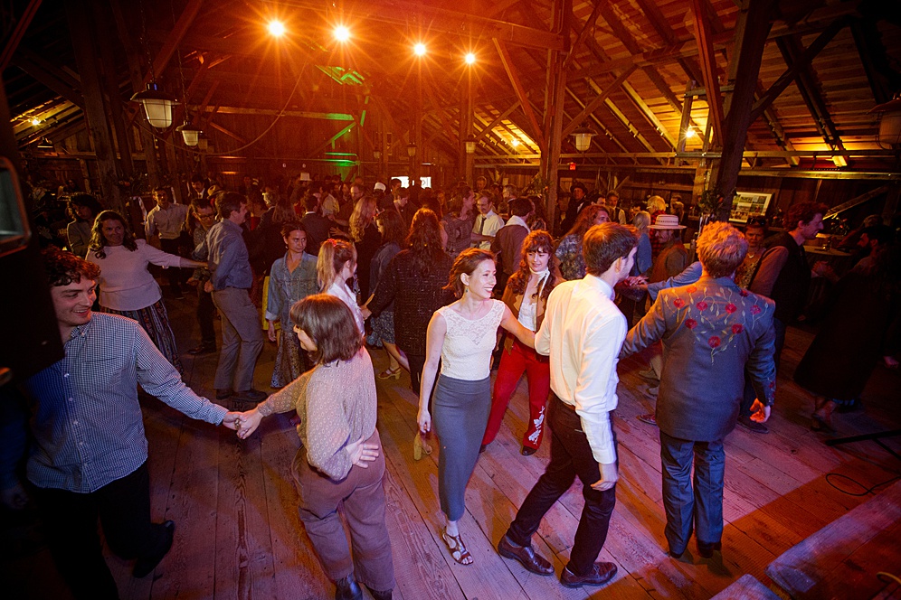wedding guests dancing at Five Springs Ranch wedding by michelle walker photography
