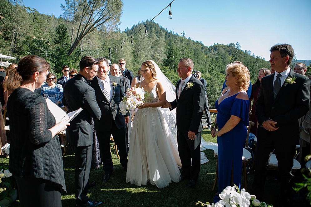 dad gives bride away at calistoga ranch wedding by michelle walker photography