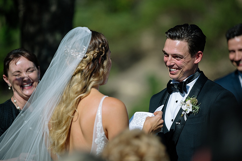 bride reads vows at calistoga ranch wedding by michelle walker photography