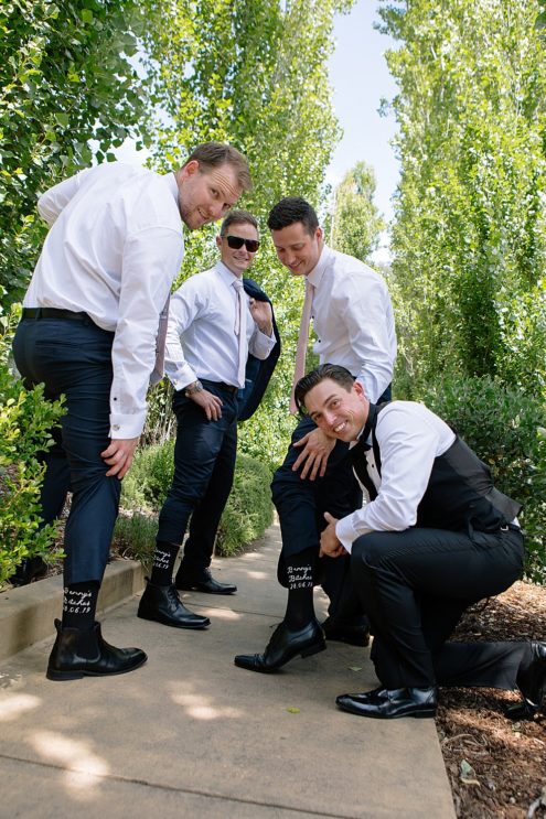 groom and groomsmen socks at calistoga ranch wedding by michelle walker photography