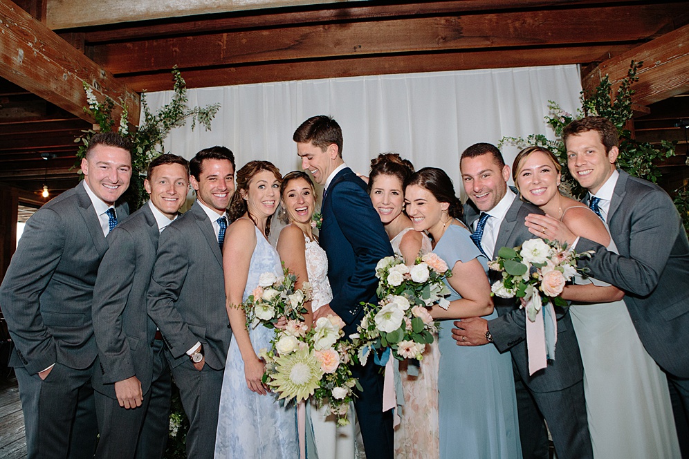 wedding party group shot at Campovida winery wedding by michelle walker photography